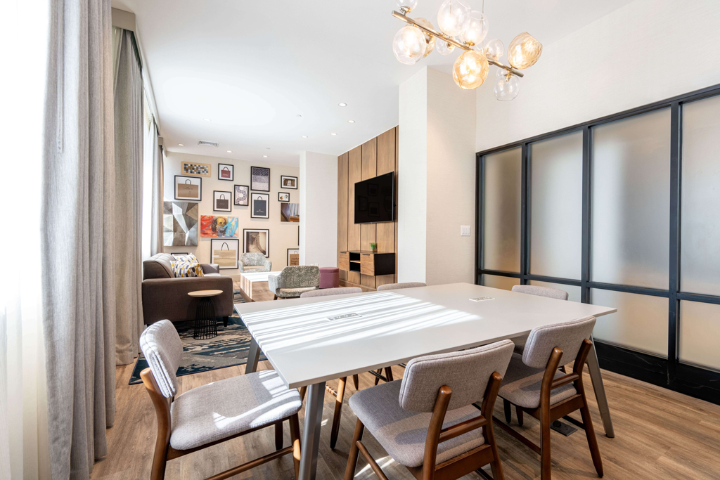 Hotel meeting room with table and chairs