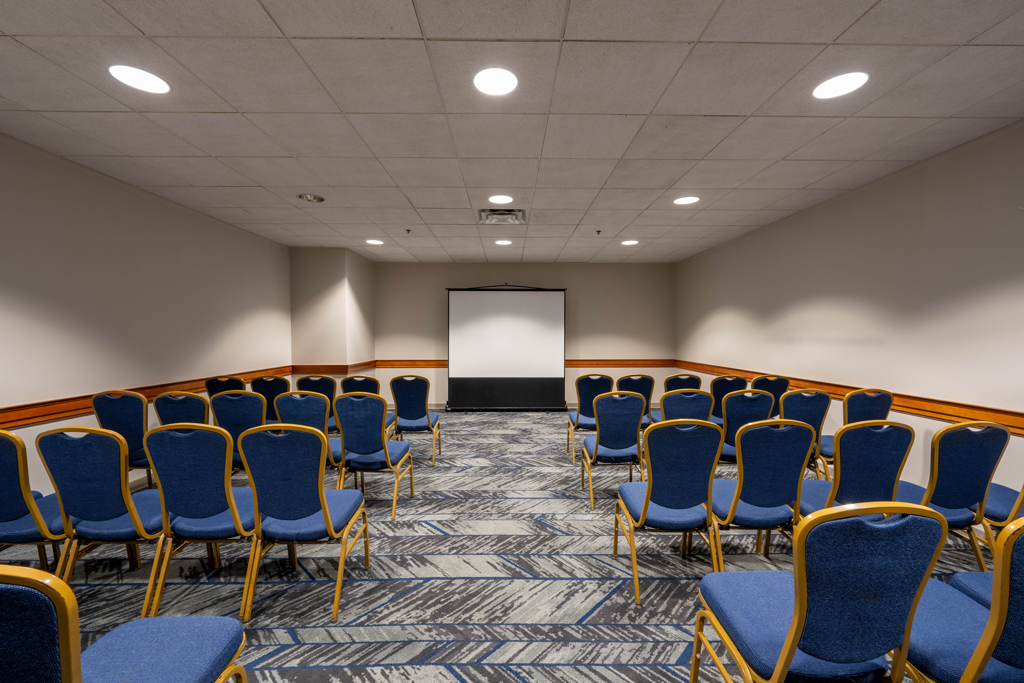 Close-up of event table setup with plates and glassware